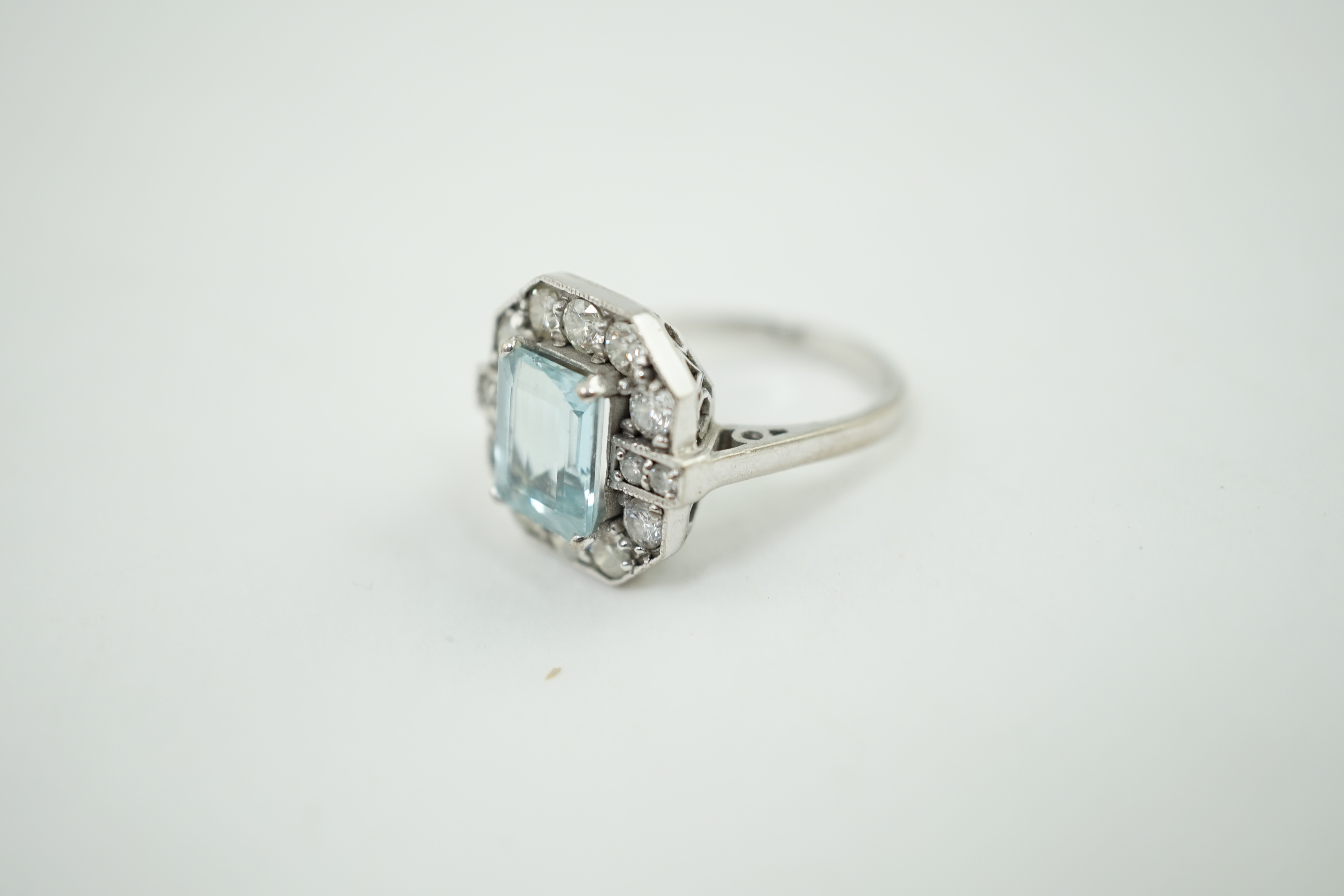 An Art Deco style white gold?, aquamarine and diamond cluster set octagonal dress ring